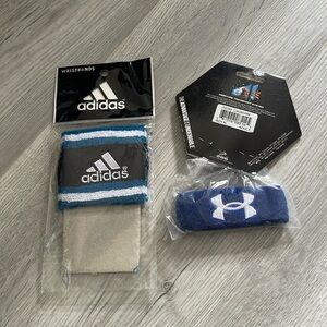 Two wristbands new in package Adudas /under Armour